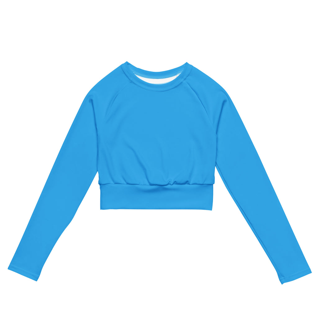 Women’s sky blue long sleeve performance crop top with ribbed waistband and crew neckline in bright blue fabric