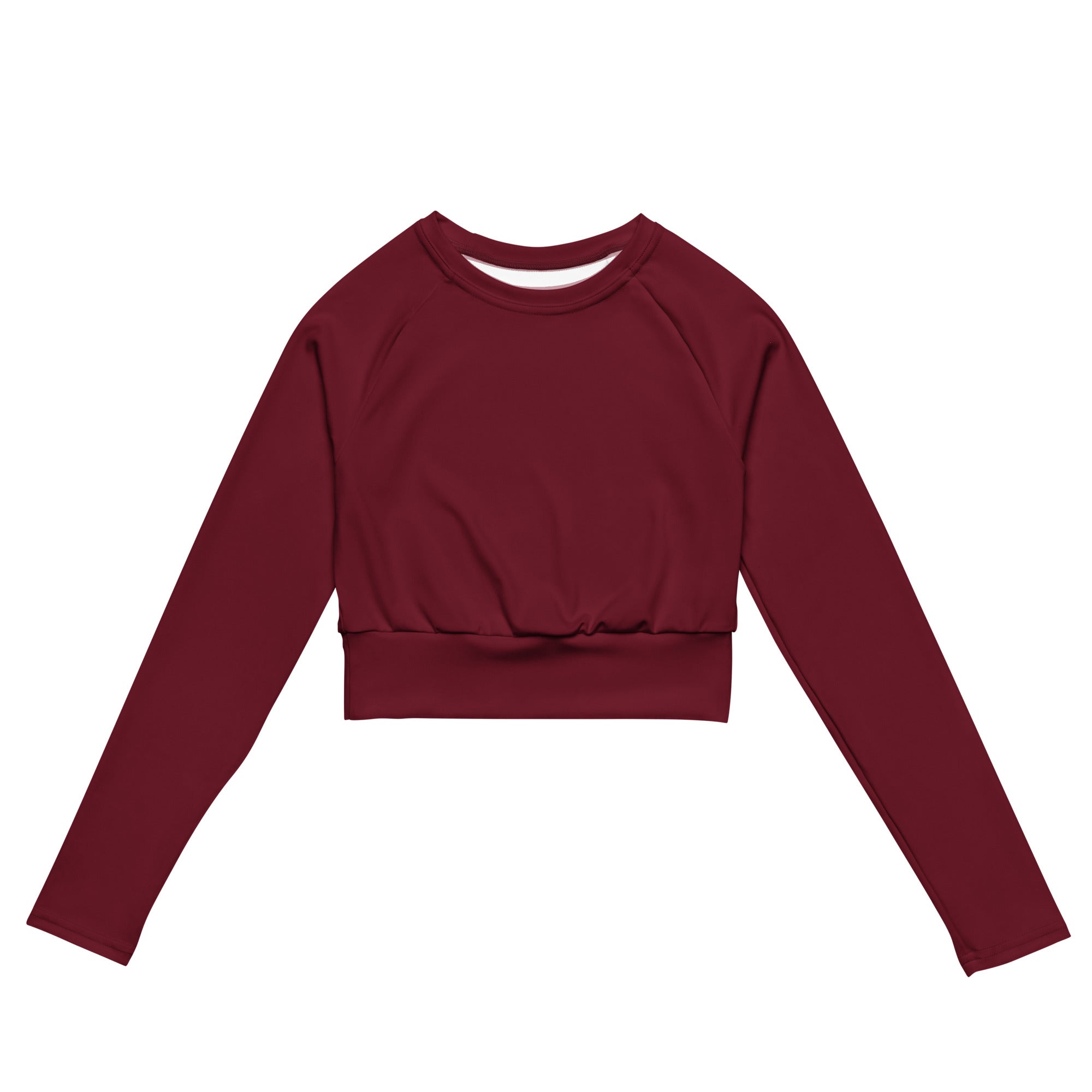 Women’s maroon long sleeve performance crop top with ribbed waistband and crew neckline in soft fabric