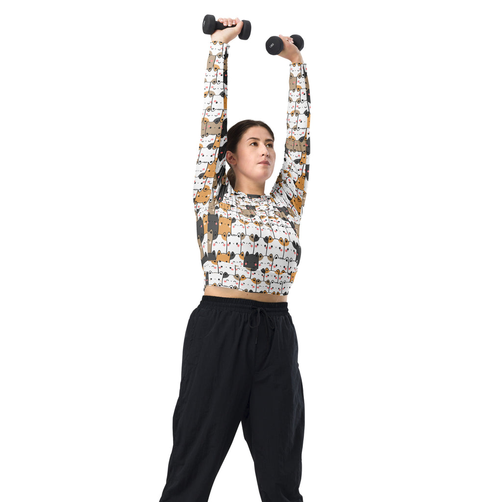 Women’s kawaii cat face white long sleeve crop top with colorful cartoon cat pattern for performance wear