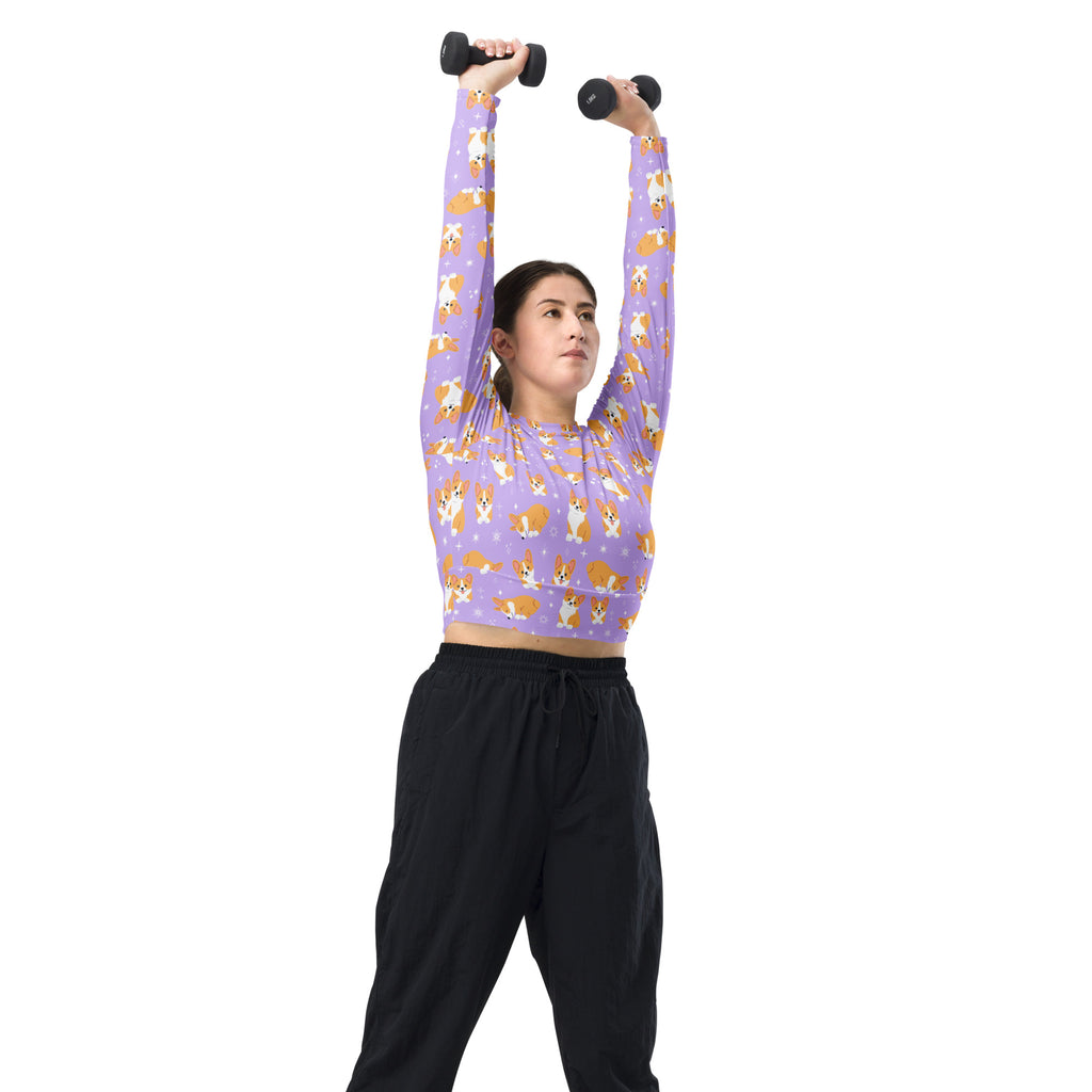 Women’s purple long sleeve crop top with corgi dog pattern made from performance fabric for active wear