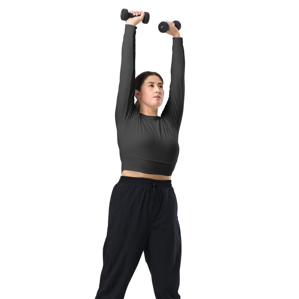 Black dumbbells with textured grips and rounded ends for strength training and fitness workouts