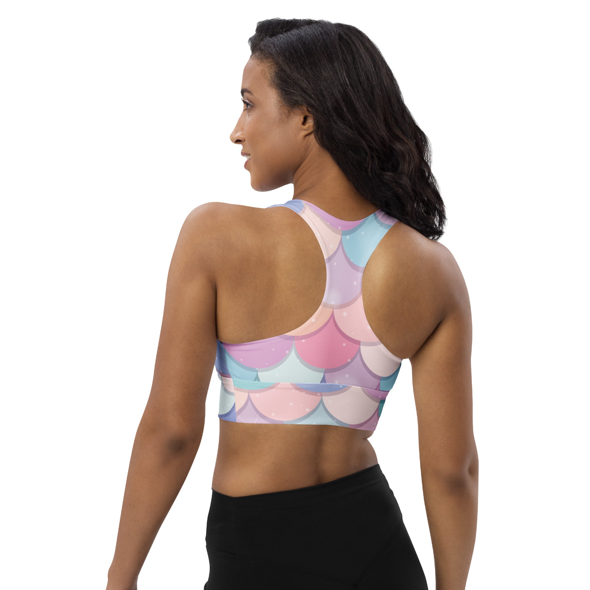 Pastel-colored rainbow mermaid-scale patterned womens longline sports bra with buttery soft recycled fabric and high support