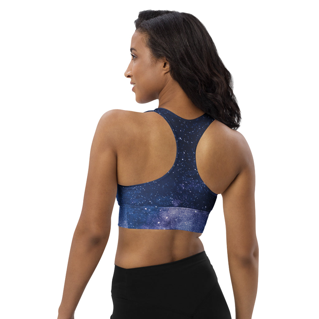 Navy blue galaxy-print longline sports bra with buttery soft recycled fabric high intensity support and quick dry features
