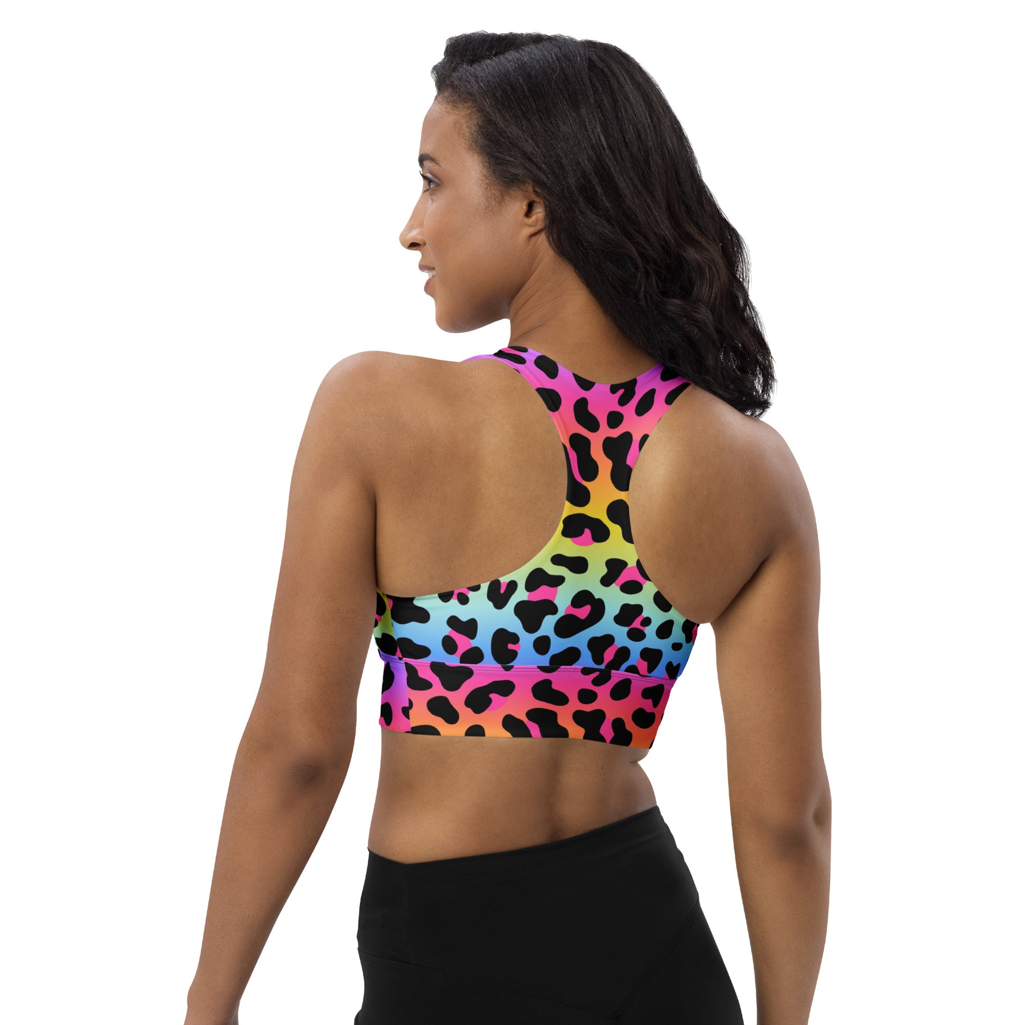 Women’s rainbow leopard print buttery soft recycled longline sports bra with black spots and racerback design