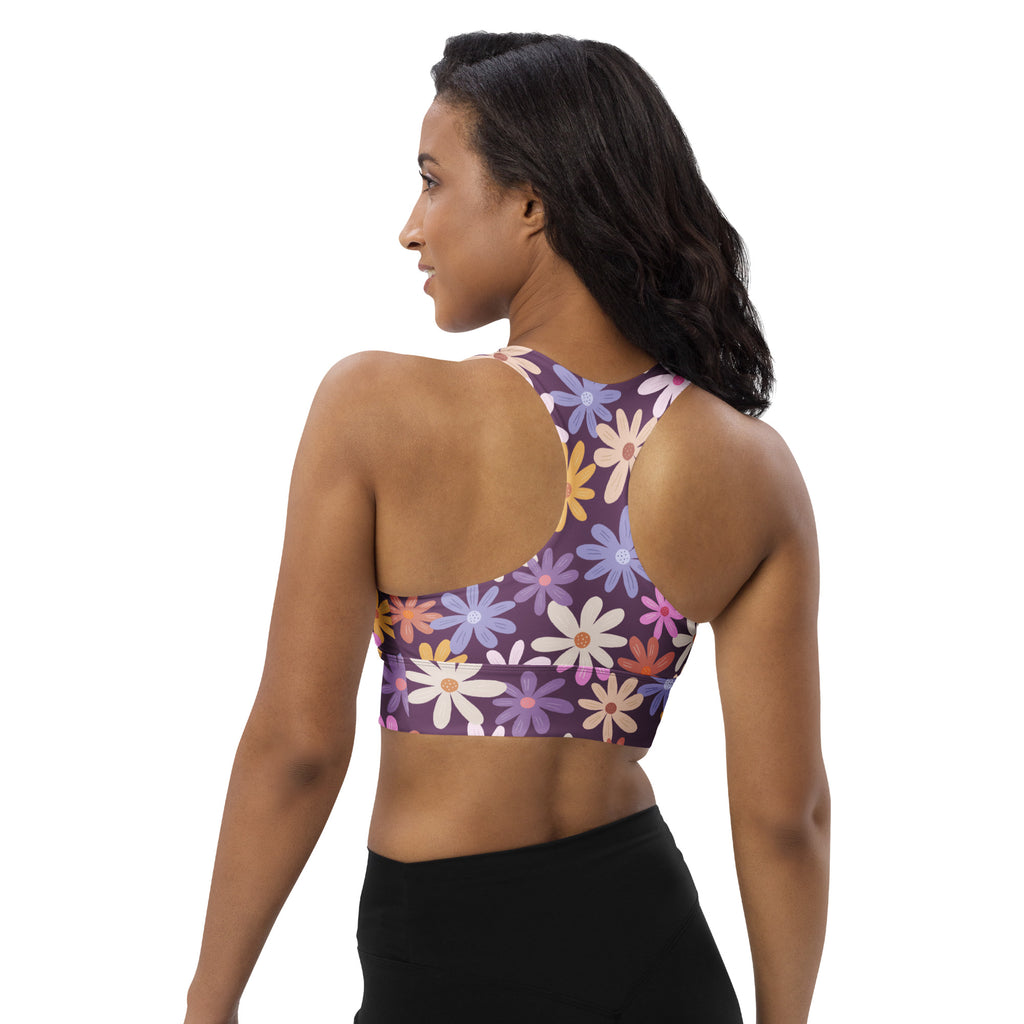Women’s purple floral buttery soft recycled longline sports bra with colorful daisy patterns for high intensity support