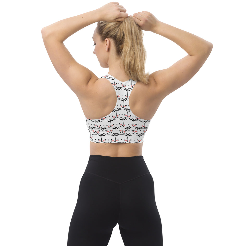 White buttery soft recycled longline sports bra with cartoon cat face pattern high intensity support and quick dry
