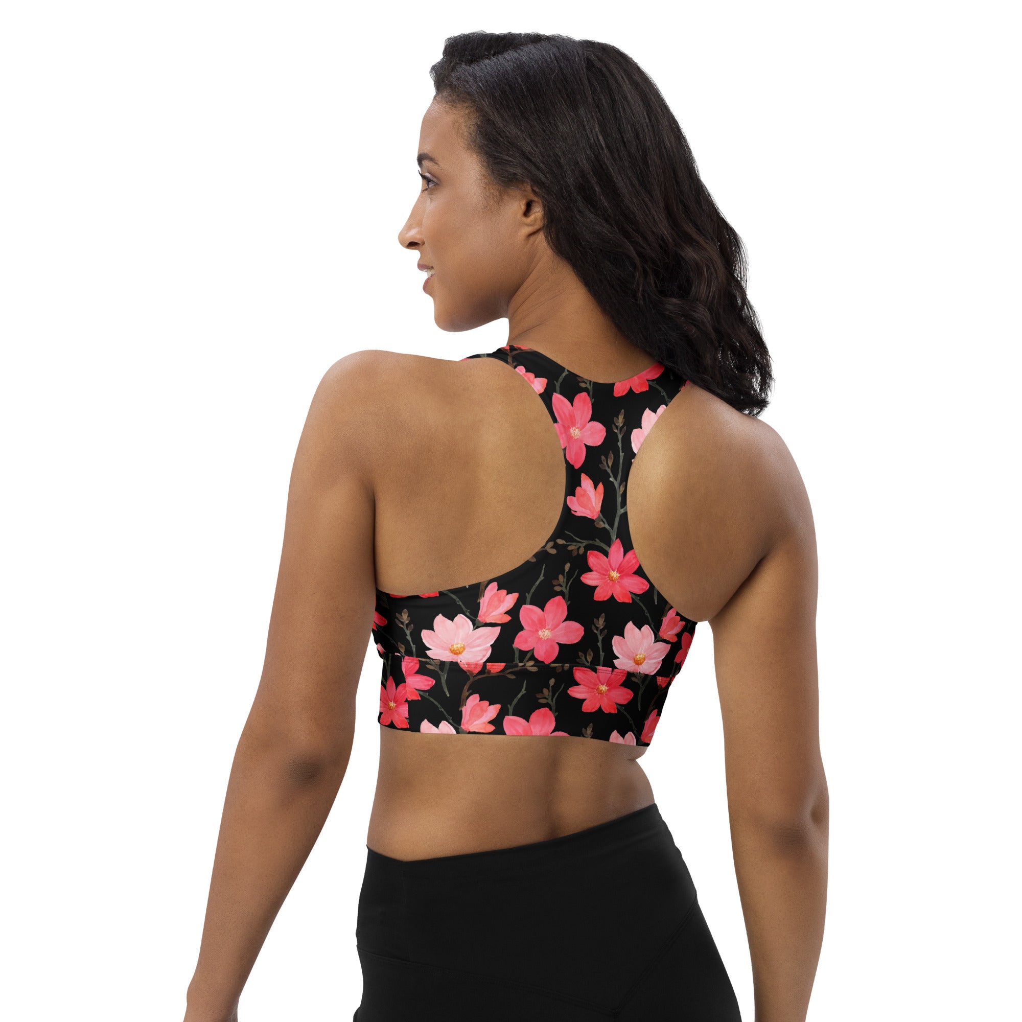 Women’s midnight floral buttery soft recycled longline sports bra in black with vibrant pink floral pattern for high intensity support