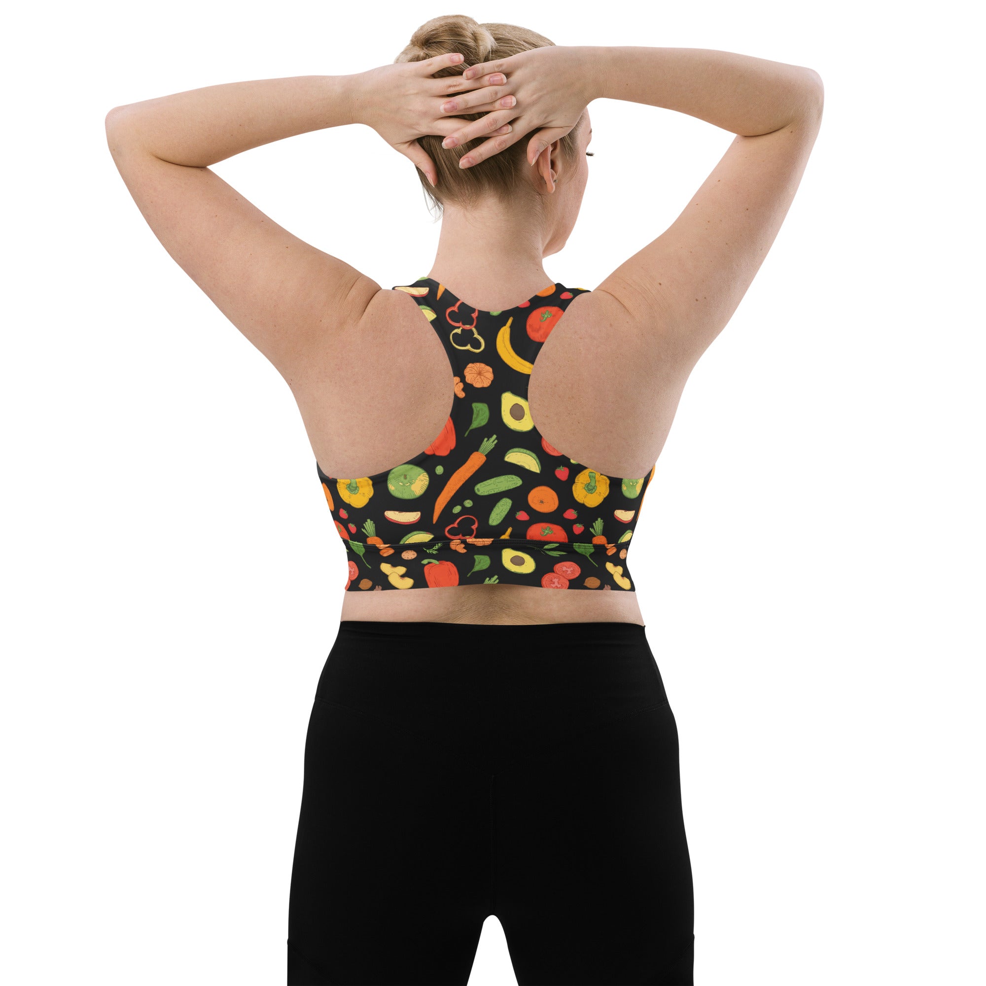 Black longline sports bra with colorful veggie print made from buttery soft recycled fabric for high intensity support