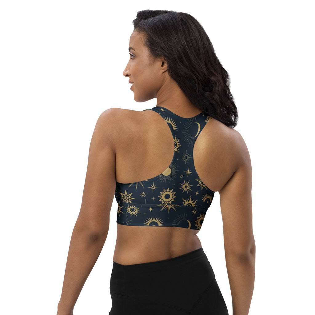 Dark blue longline sports bra with gold sun moon and star celestial pattern buttery soft recycled fabric