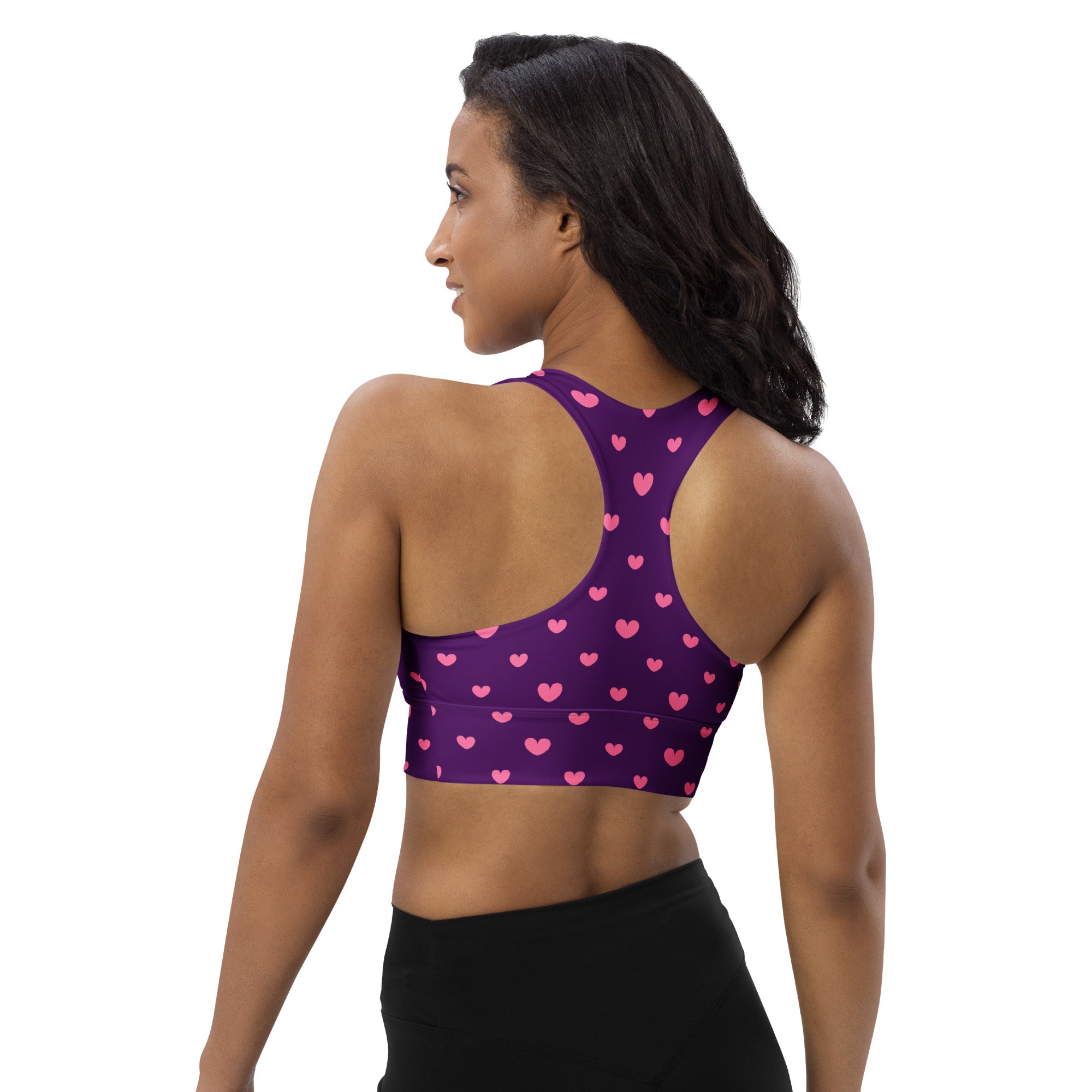 Women’s purple longline sports bra with pink heart pattern buttery soft recycled fabric high intensity support
