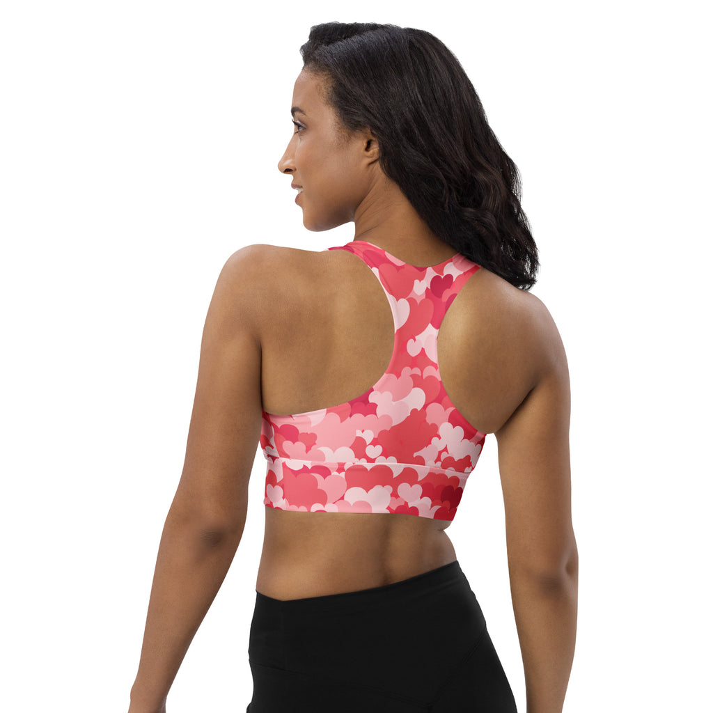 Women’s pink and white heart-patterned buttery soft recycled longline sports bra with racerback for high intensity support