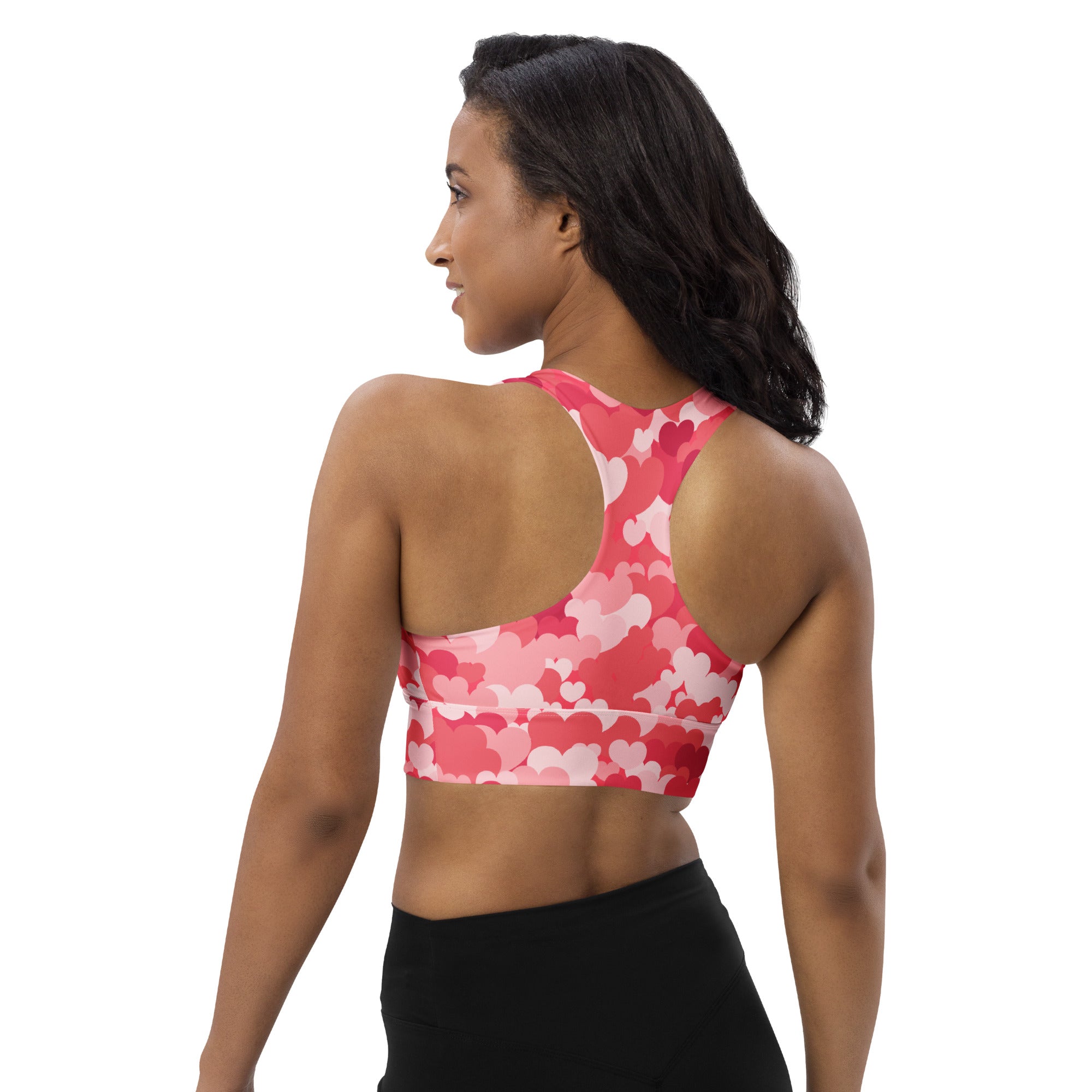 Women’s pink and white heart-patterned buttery soft recycled longline sports bra with racerback for high intensity support