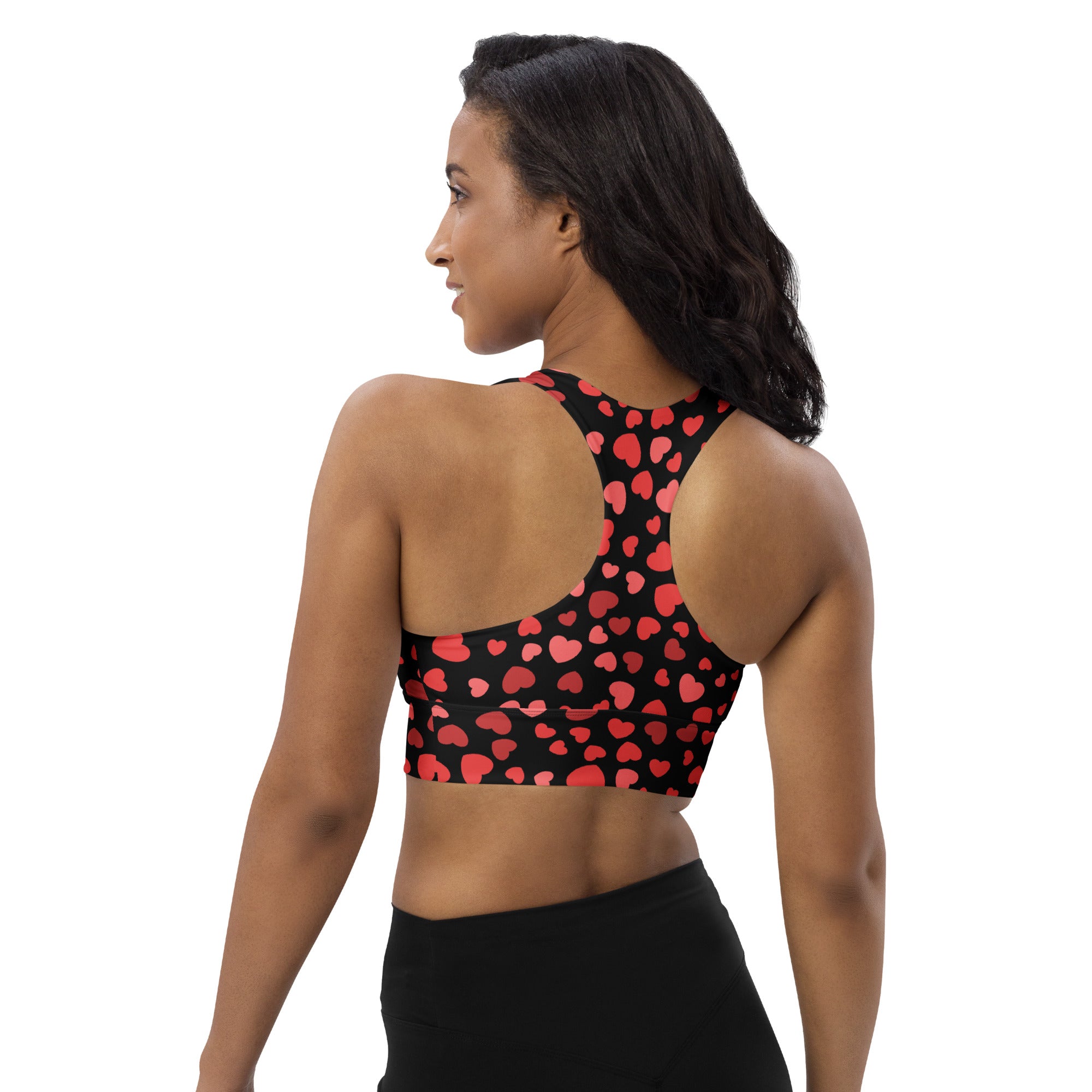 Black women’s longline sports bra with red heart pattern buttery soft recycled fabric high intensity support