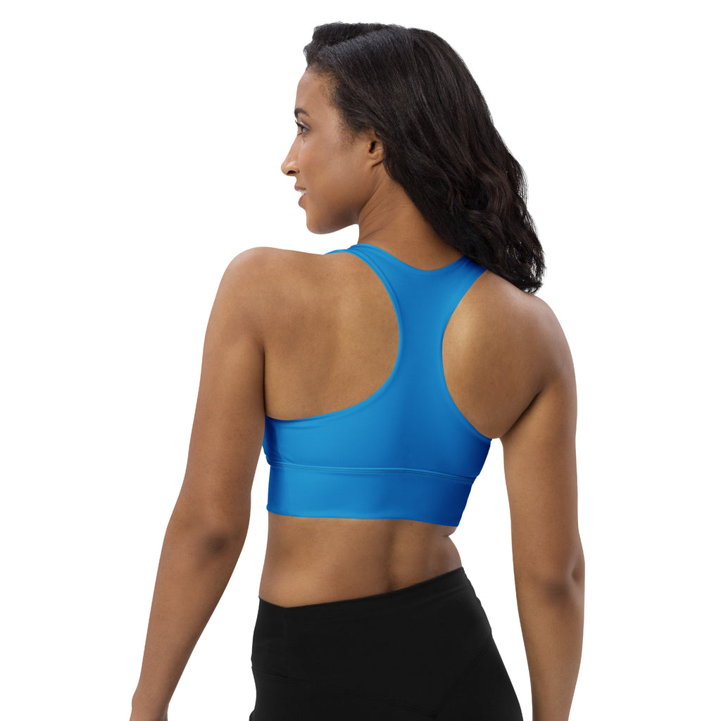 Vibrant blue recycled longline sports bra with buttery soft fabric racerback straps and high intensity support