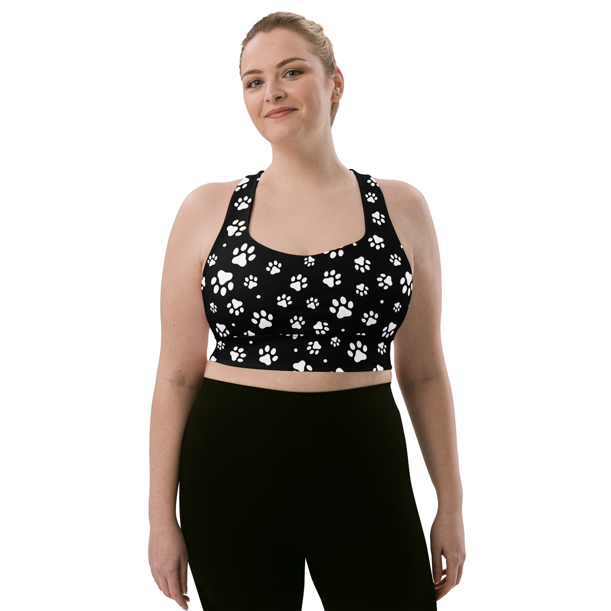 Women’s black longline sports bra with white paw print pattern buttery soft recycled fabric high intensity support