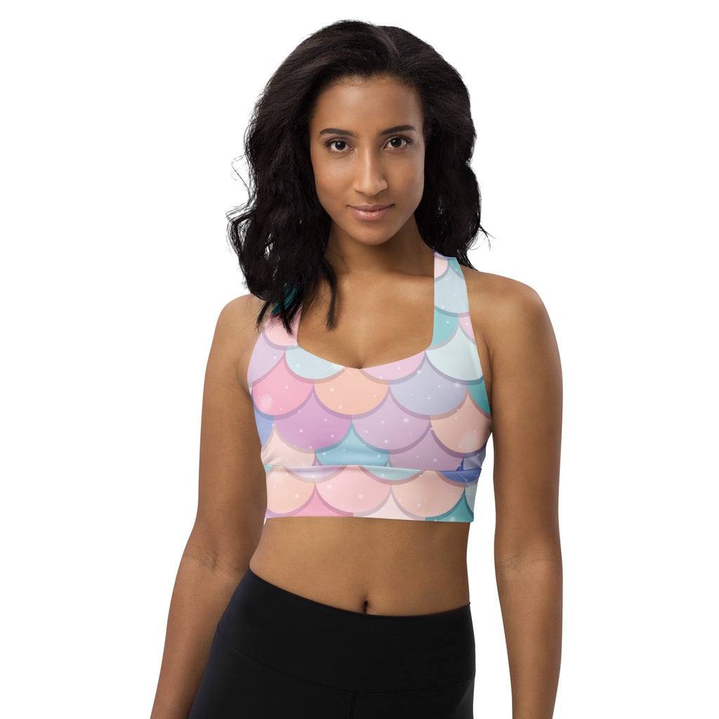 Pastel-colored mermaid-scale patterned longline sports bra with halter neck, buttery soft recycled fabric, high intensity support