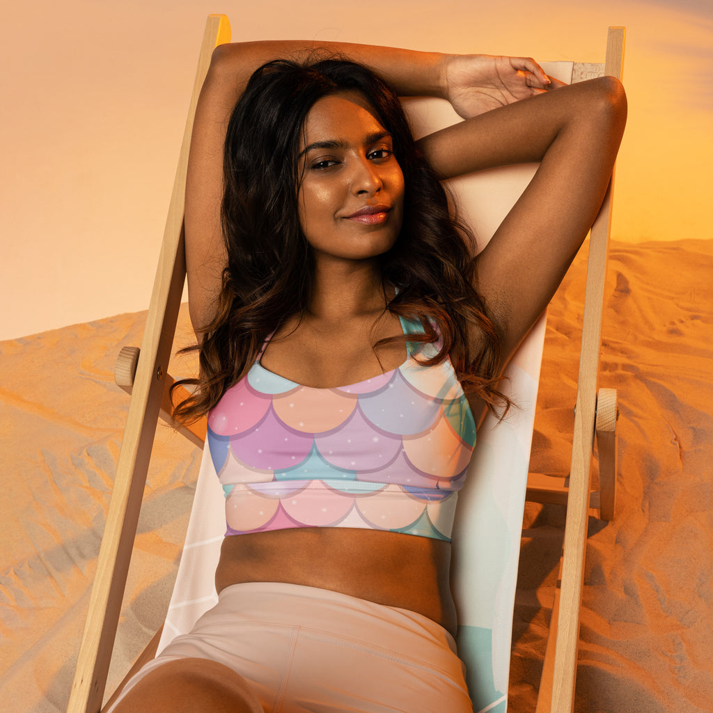 Women’s pastel-colored rainbow mermaid scale longline sports bra with buttery soft recycled fabric and high intensity support