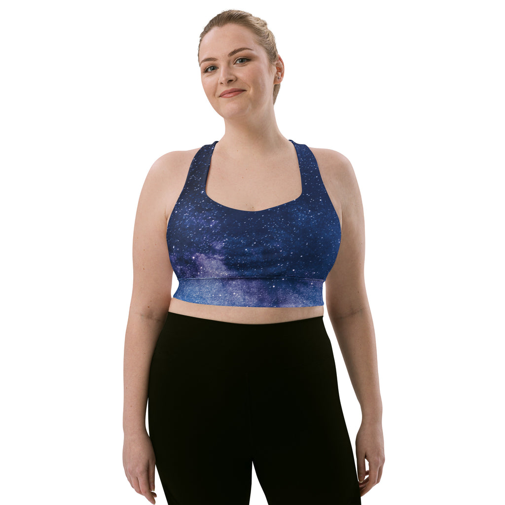 Women’s realistic galaxy buttery soft recycled longline sports bra in blue gradient with star speckles and high intensity support
