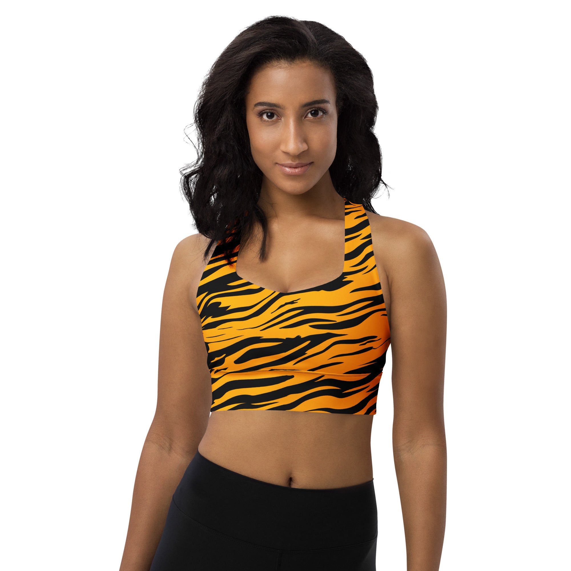 A vibrant orange and black tiger stripe recycled longline sports bra with halter neckline for high intensity support
