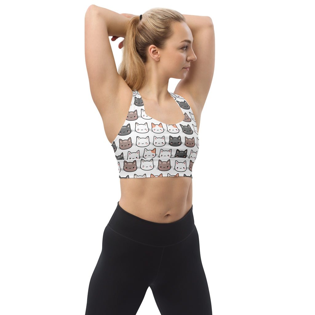 White longline sports bra with playful colorful cartoon cat pattern buttery soft recycled fabric high intensity support