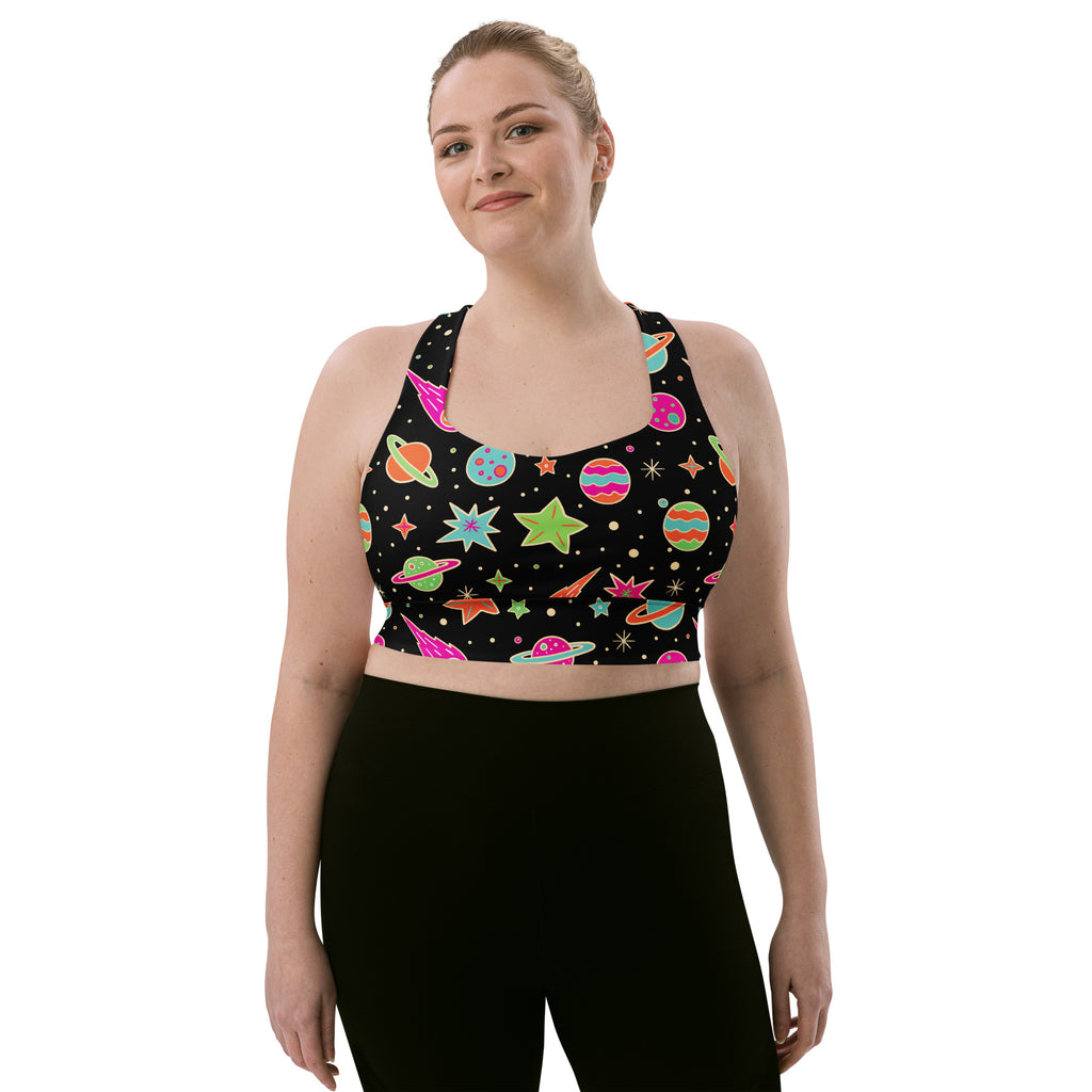 Black women’s retro space longline sports bra with vibrant cosmic pattern high intensity support and quick dry fabric