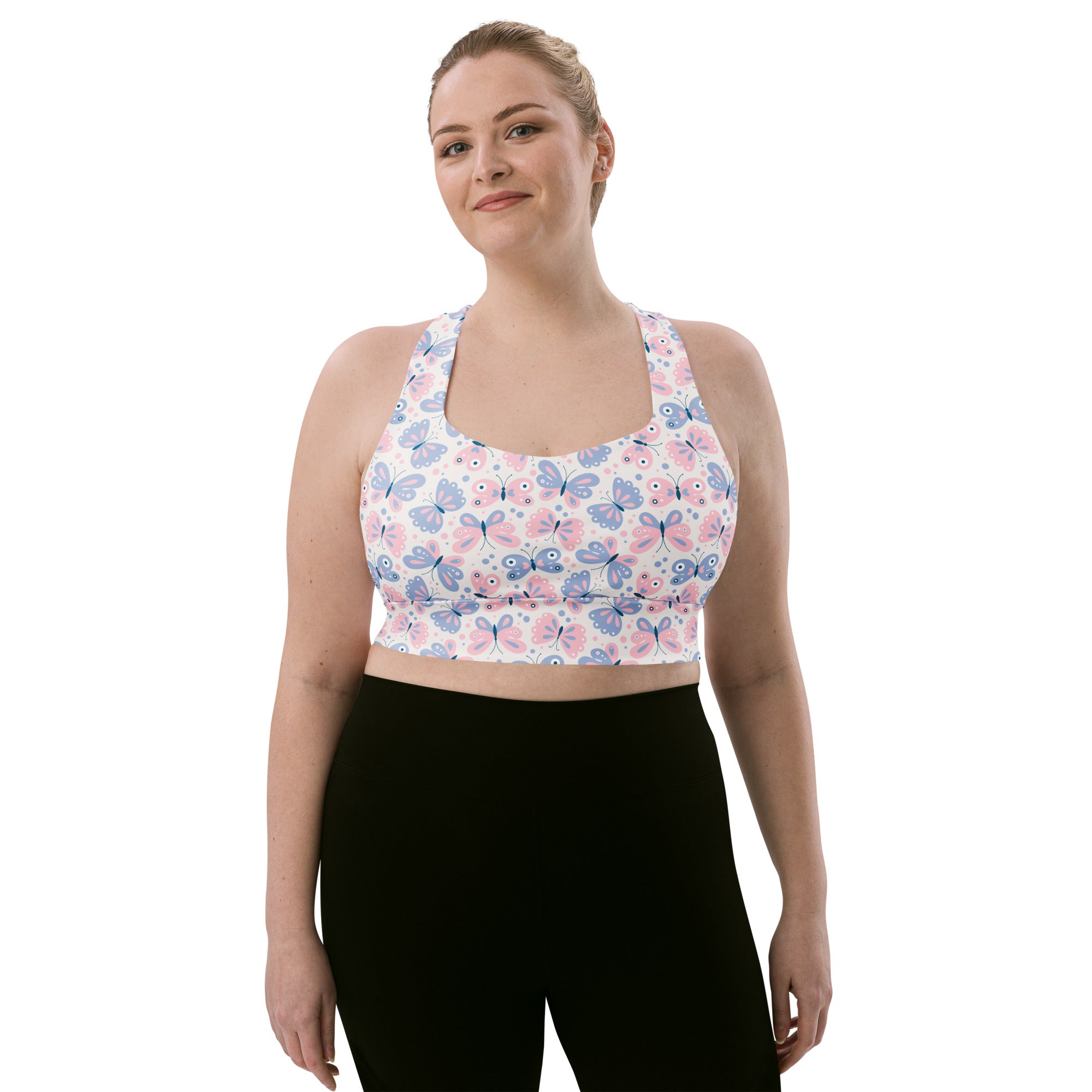 White recycled longline sports bra with pink and blue butterfly print buttery soft fabric high intensity support