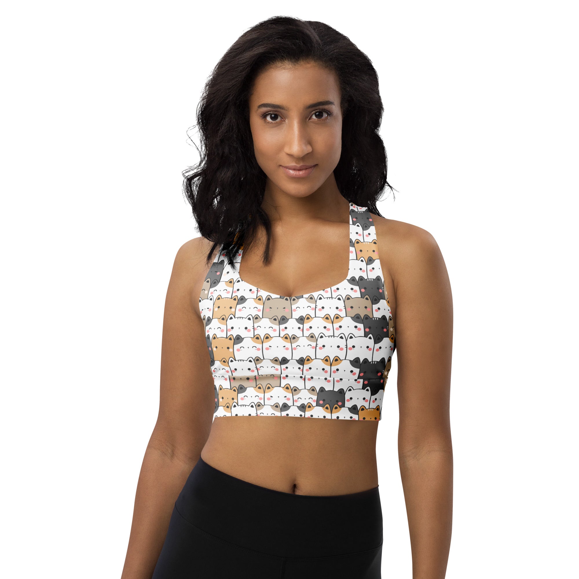 White kawaii cat longline sports bra with colorful cartoon cats made from buttery soft recycled fabric for high intensity support