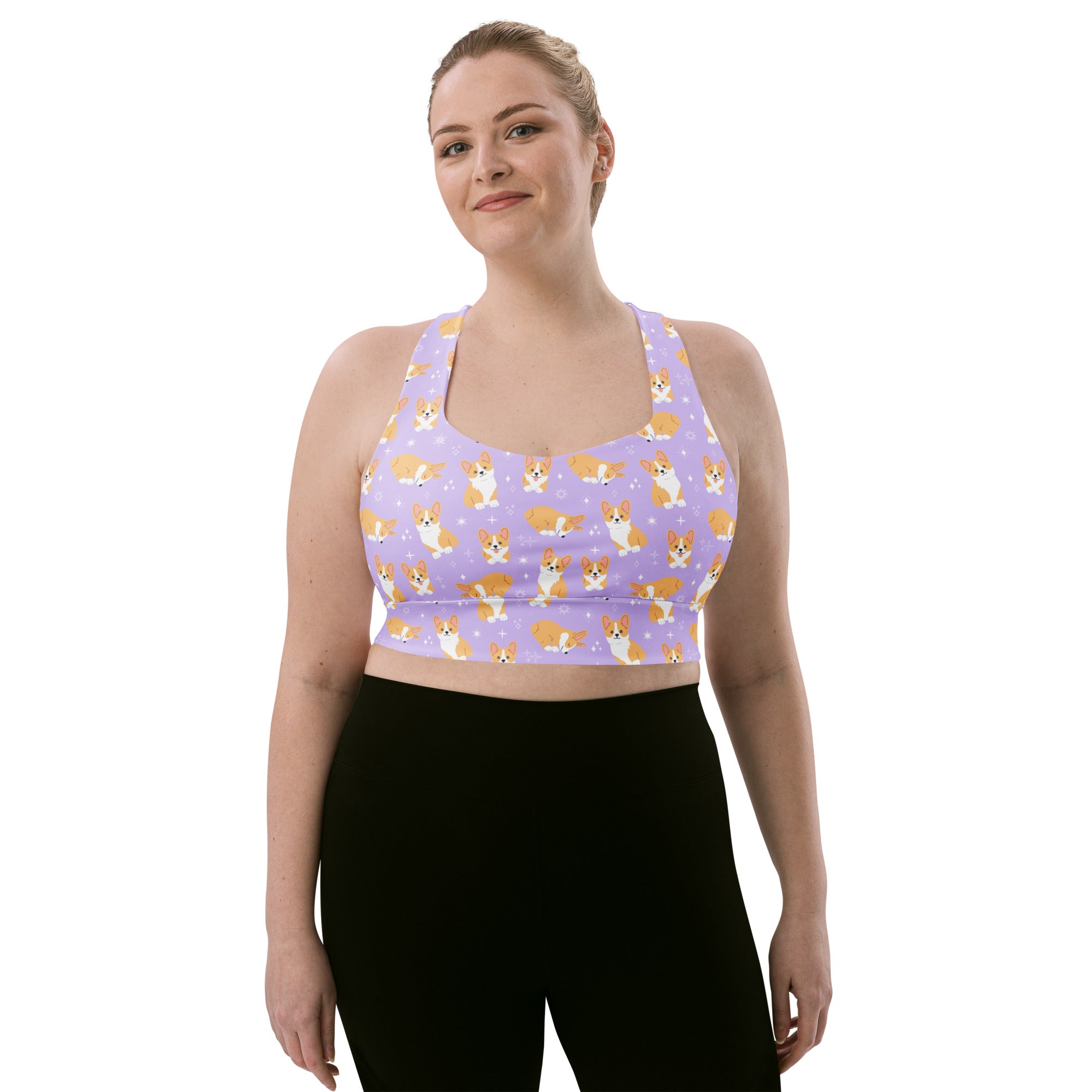 Women’s purple longline sports bra with high intensity support featuring a playful orange and white corgi pattern