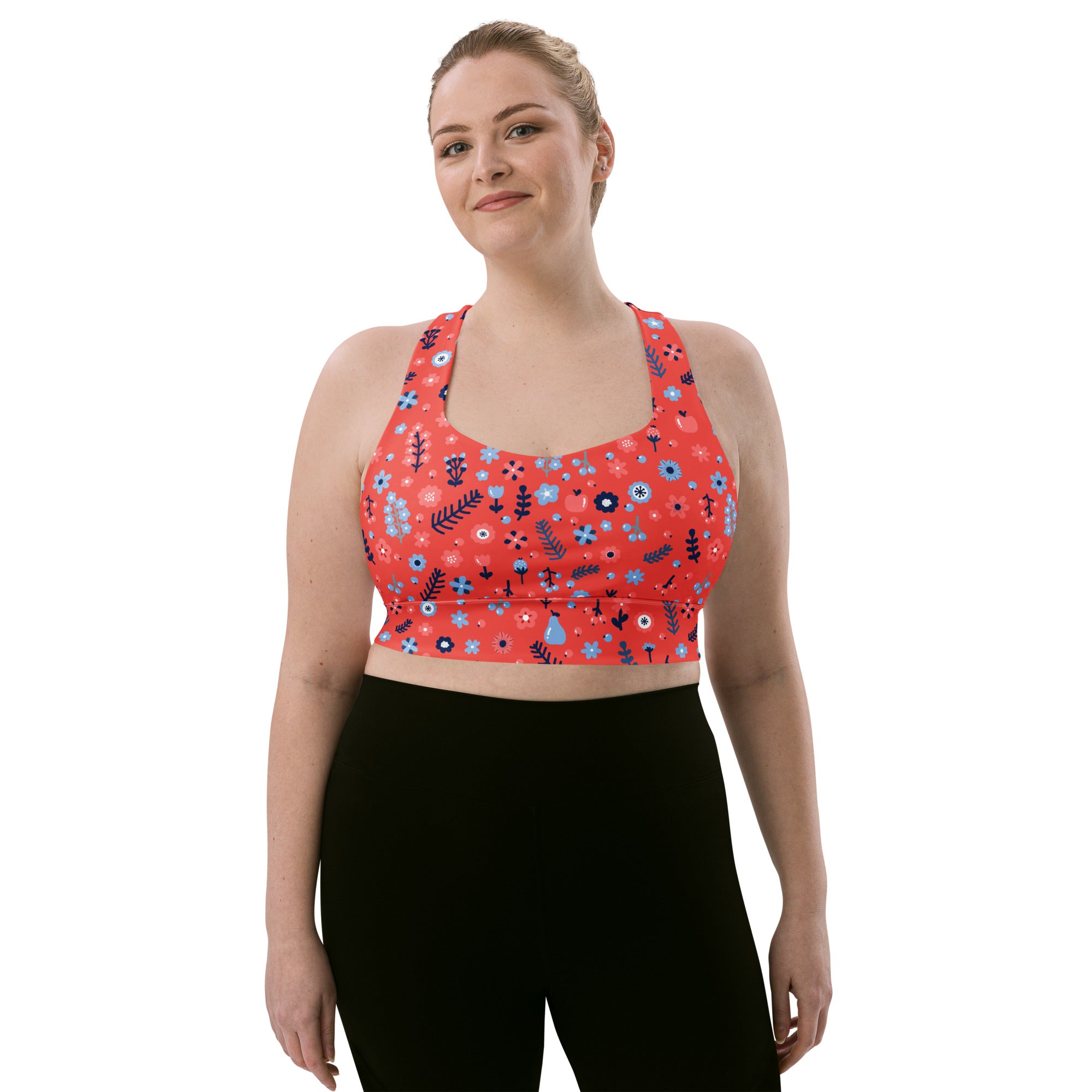 Women’s coral red floral sports bra with thin straps buttery soft recycled fabric high intensity support