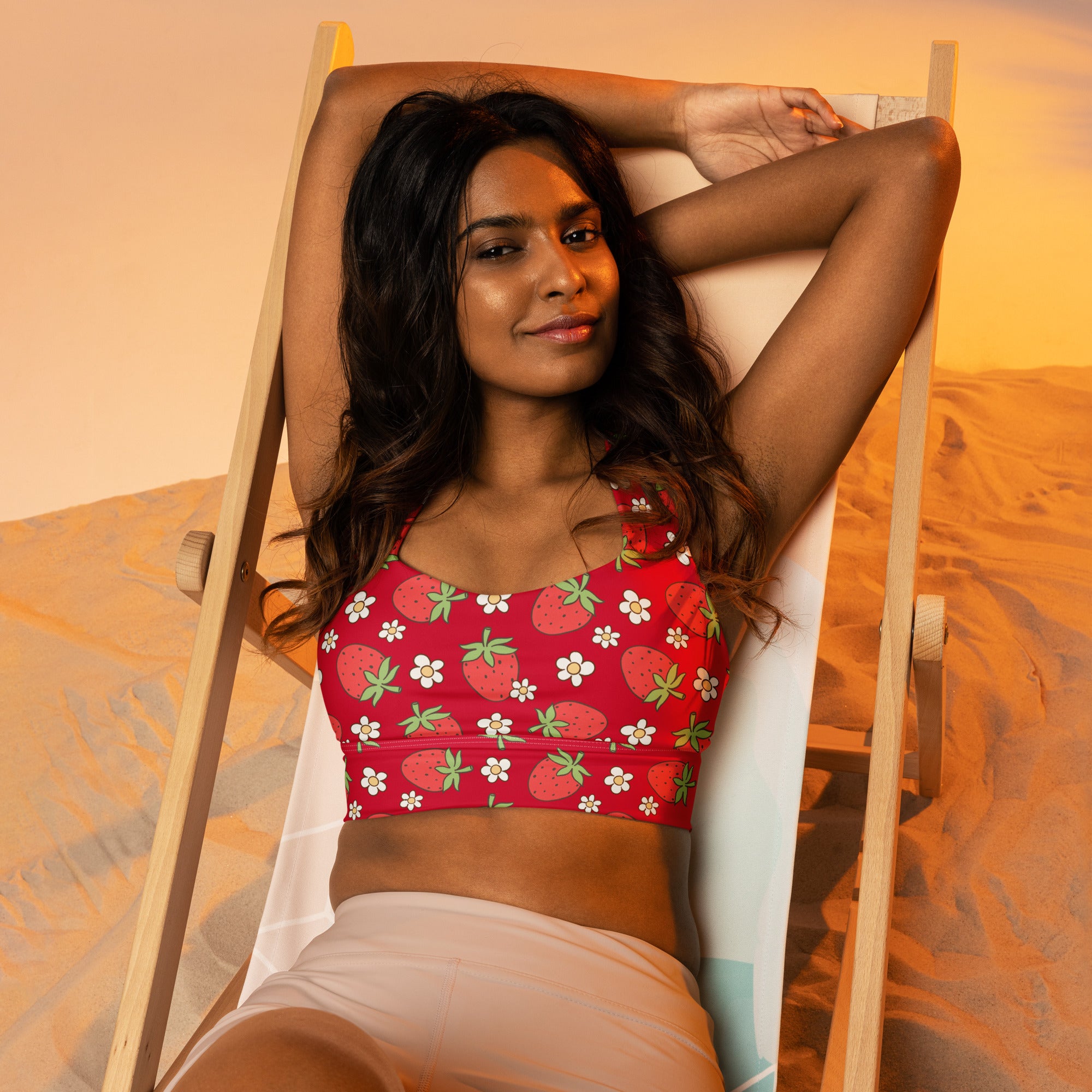 Women’s buttery soft recycled longline sports bra with red strawberry and white daisy print for high intensity support