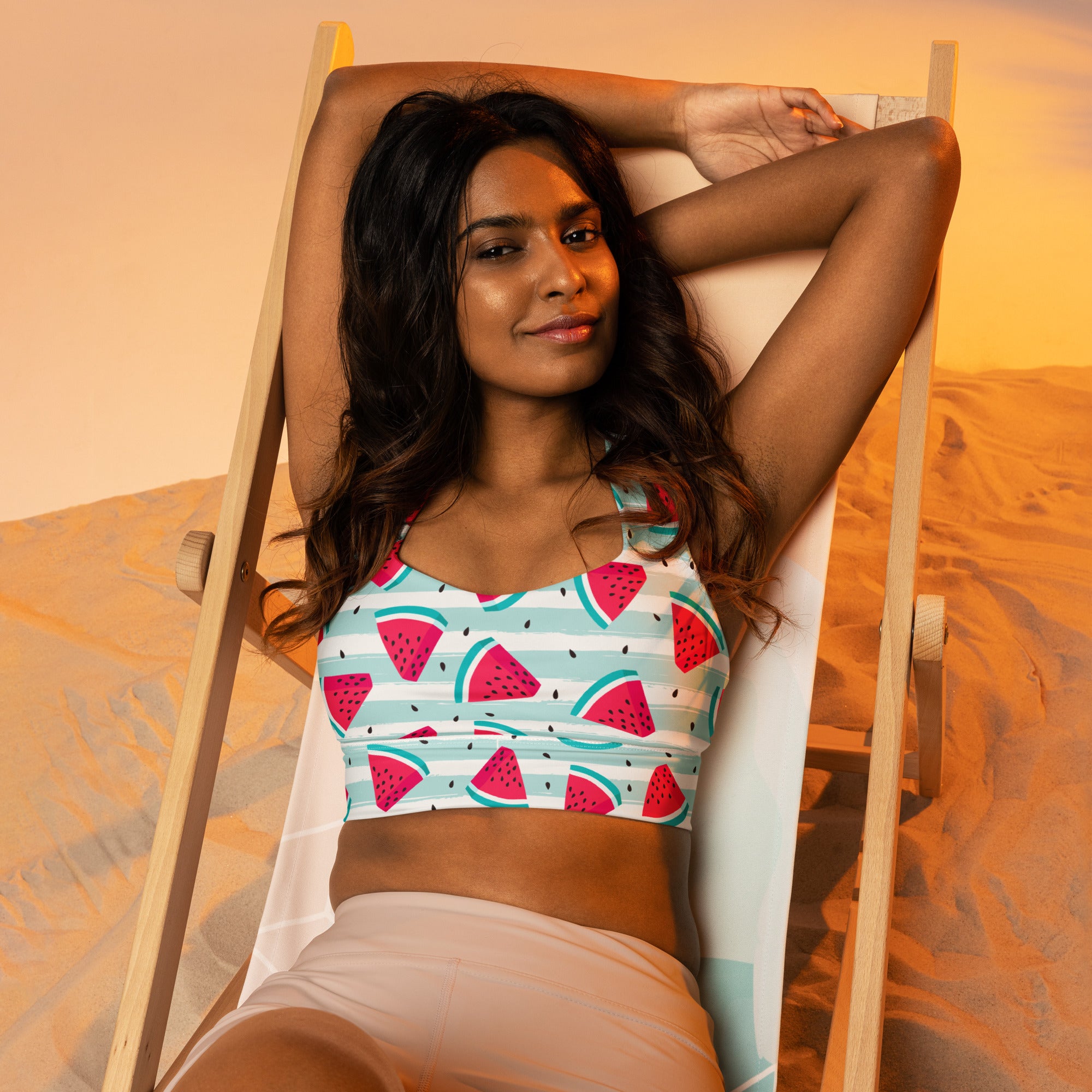 Women’s watermelon print buttery soft recycled longline sports bra with teal and white stripes for high intensity support