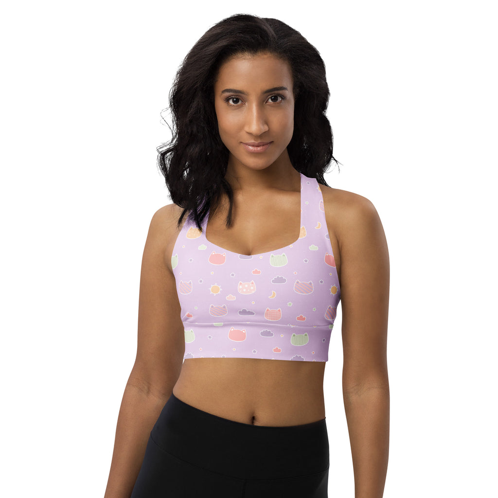 Lavender longline sports bra with pastel kawaii cats and clouds pattern made from buttery soft recycled fabric