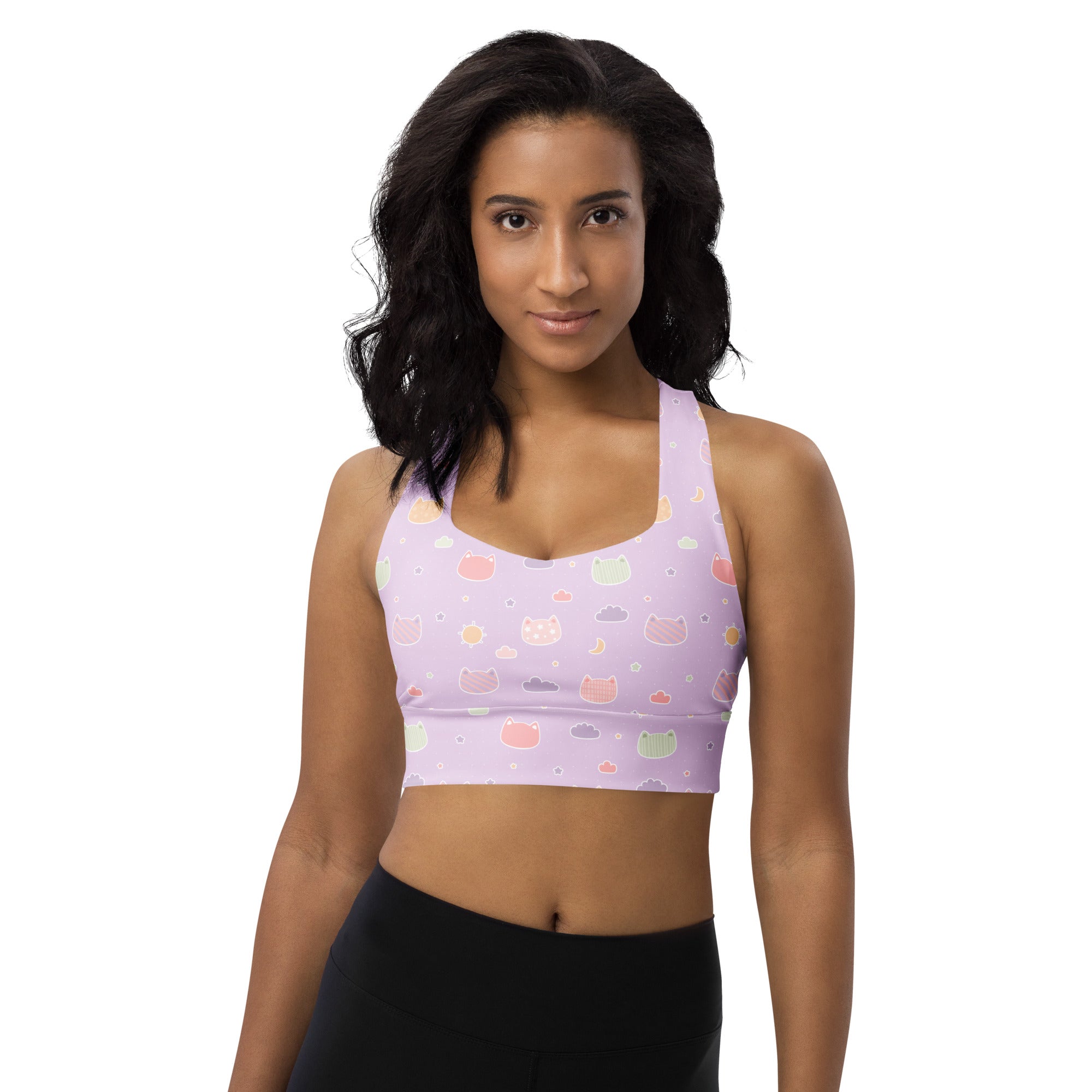 Lavender longline sports bra with pastel kawaii cats and clouds pattern made from buttery soft recycled fabric