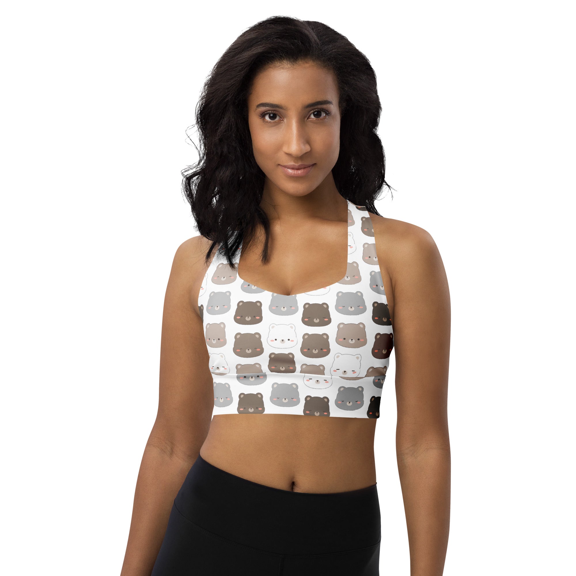 White recycled longline sports bra with playful brown gray and black bear face print high intensity support