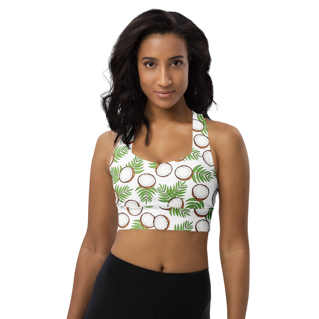 White longline sports bra with tropical green palm leaves and brown coconut print made from buttery soft recycled fabric