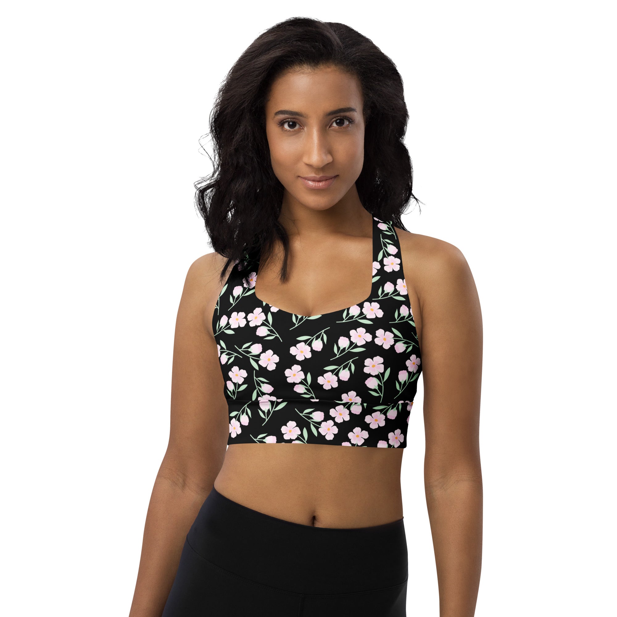 Women’s black floral print buttery soft recycled longline sports bra with pink cherry blossoms for high intensity support