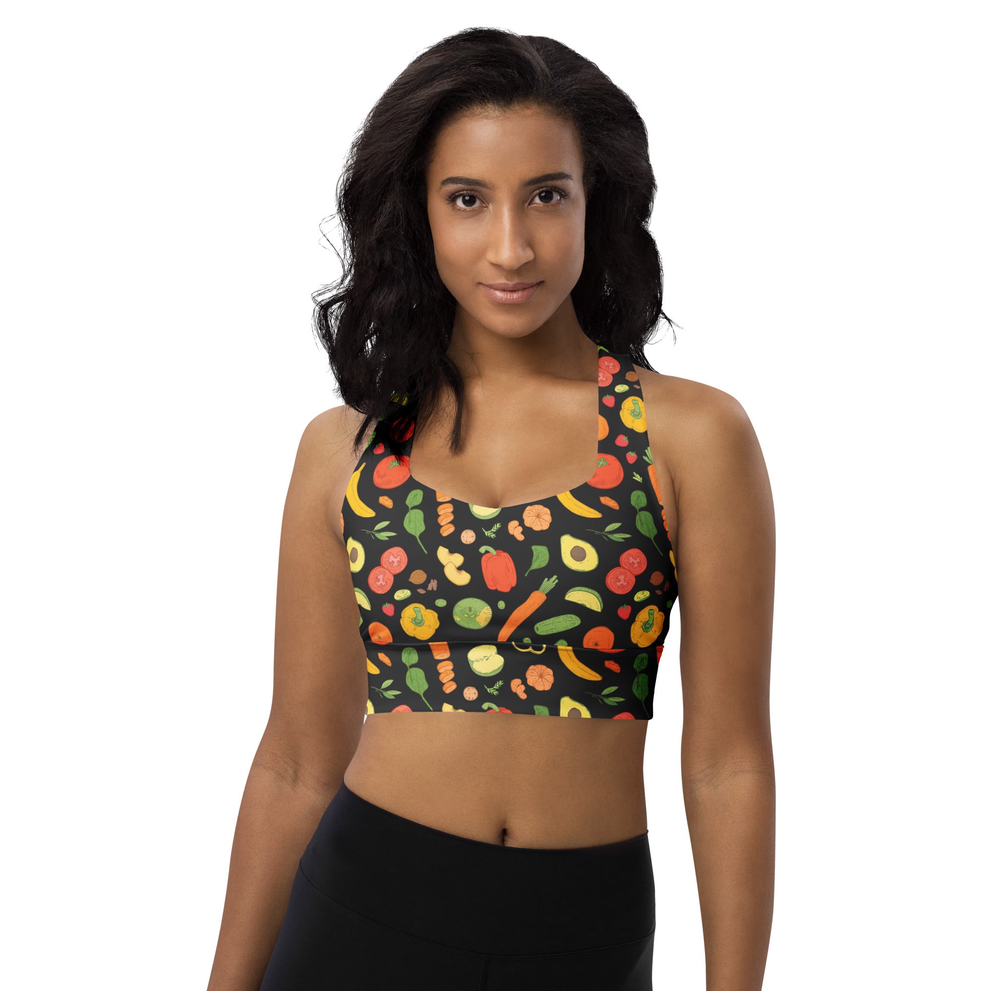 Black longline sports bra with vibrant veggie print made from buttery soft recycled fabric for high intensity support