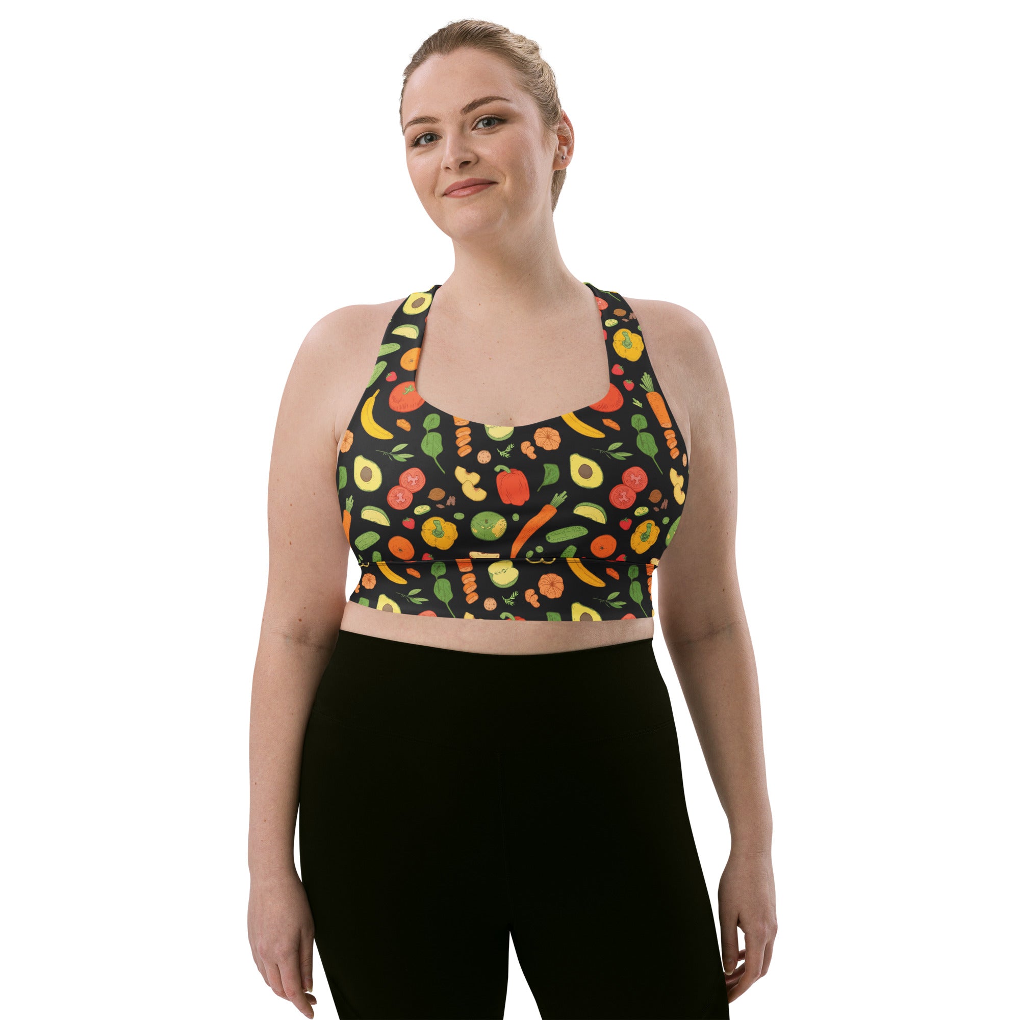 Black longline sports bra with vibrant cartoon fruit and vegetable print, buttery soft recycled fabric, high intensity support
