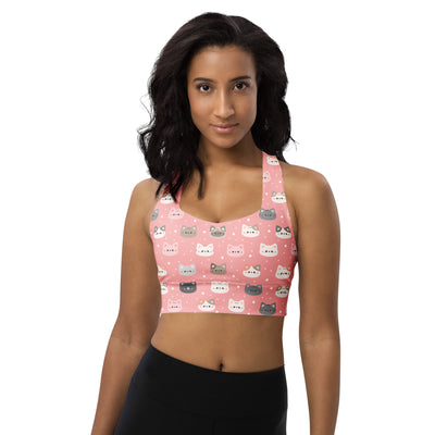 Women’s pink longline sports bra with playful multicolor cartoon cat pattern buttery soft recycled fabric