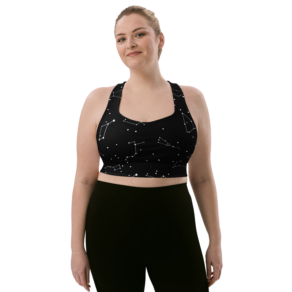 Women’s black recycled longline sports bra with white star and constellation patterns buttery soft high intensity support