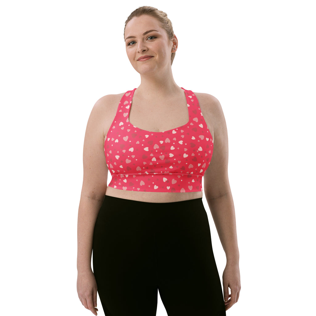 Women’s valentine’s day pink heart longline sports bra with buttery soft recycled fabric and high intensity support