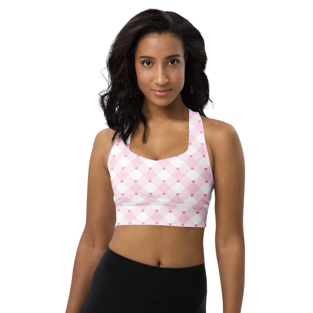 Women’s valentine’s day pink and white argyle heart sports bra with buttery soft recycled fabric and high intensity support