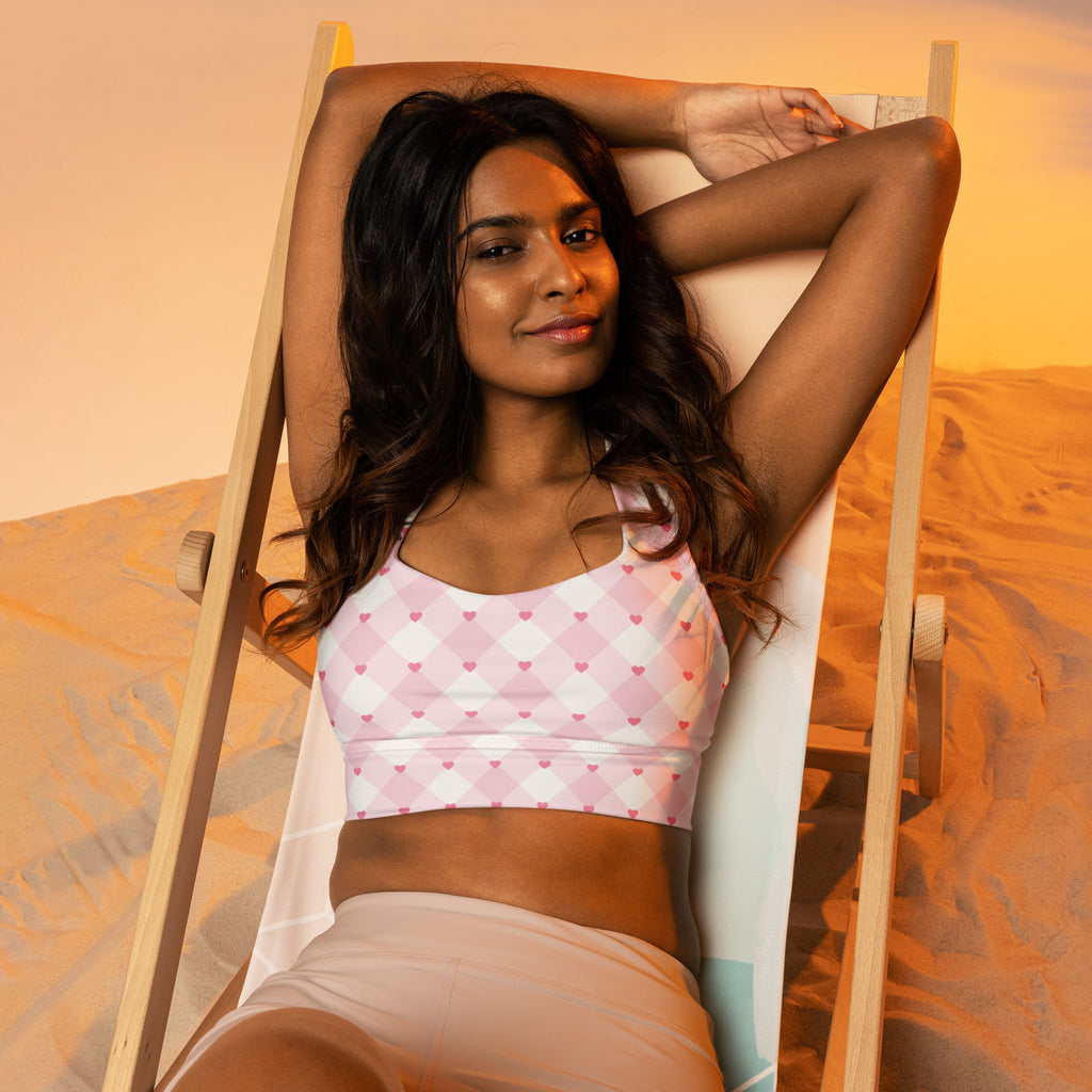 Women’s valentine’s day pink and white argyle heart sports bra with buttery soft recycled fabric and high intensity support