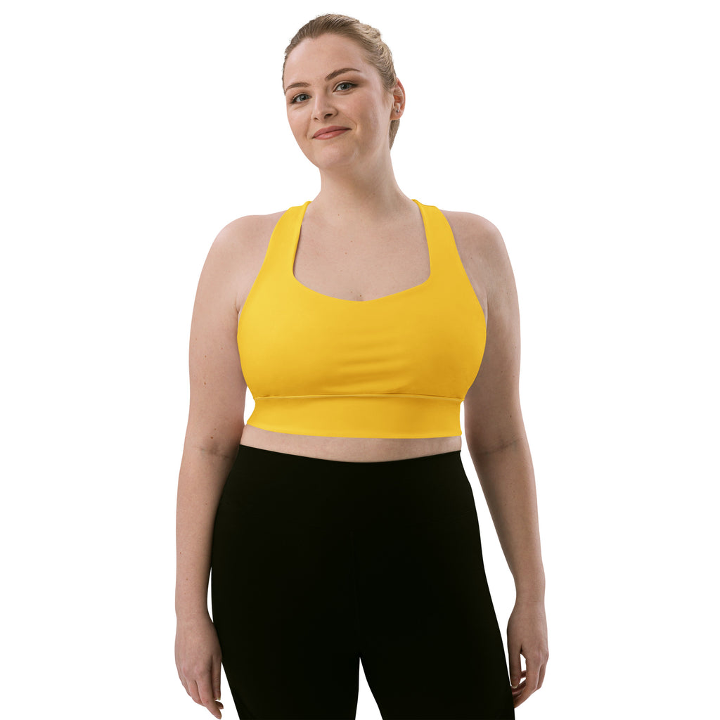 Bright yellow seamless recycled sports bra with scoop neckline racerback high intensity support and quick dry fabric