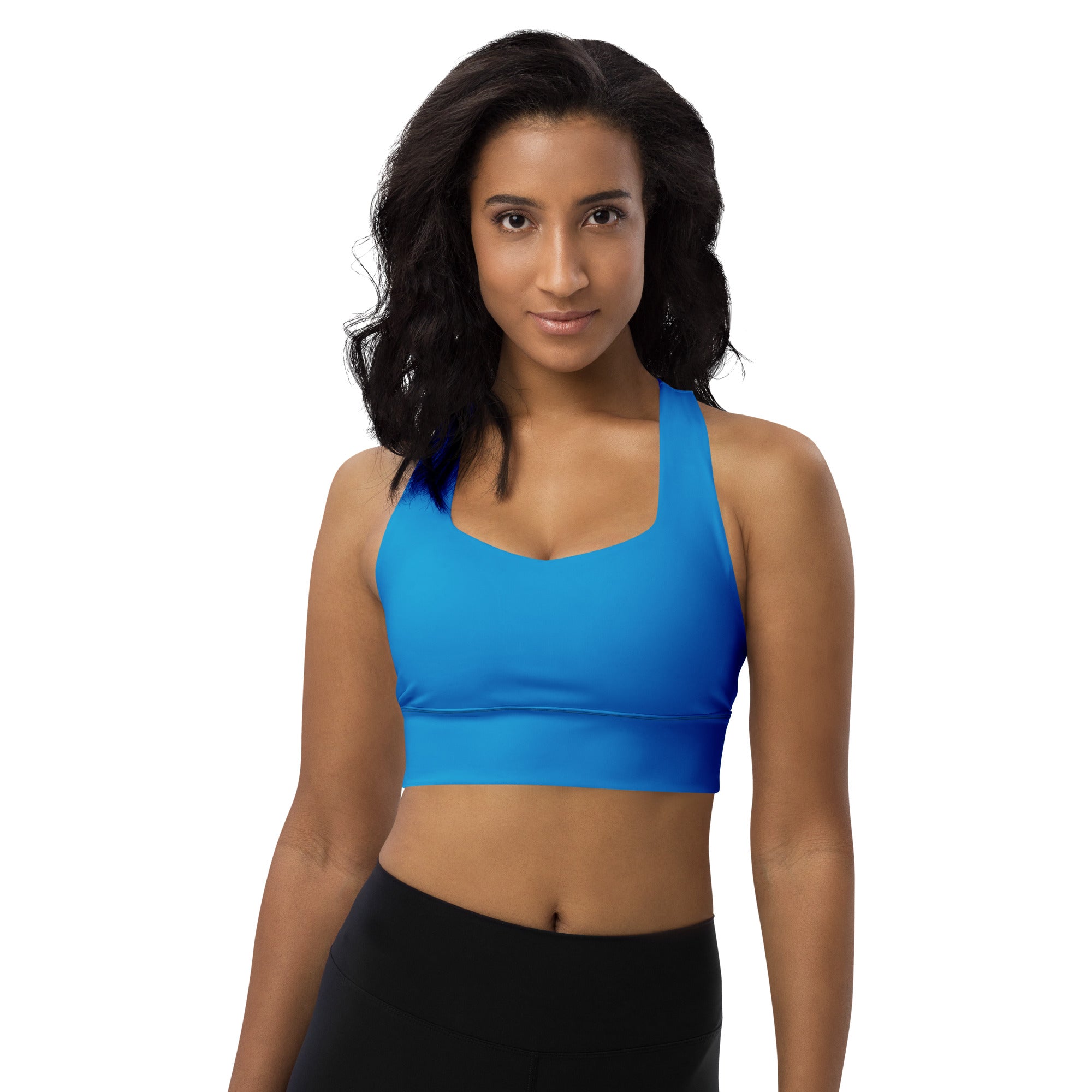 Bright blue seamless recycled longline sports bra with scoop neckline and adjustable straps for high intensity support
