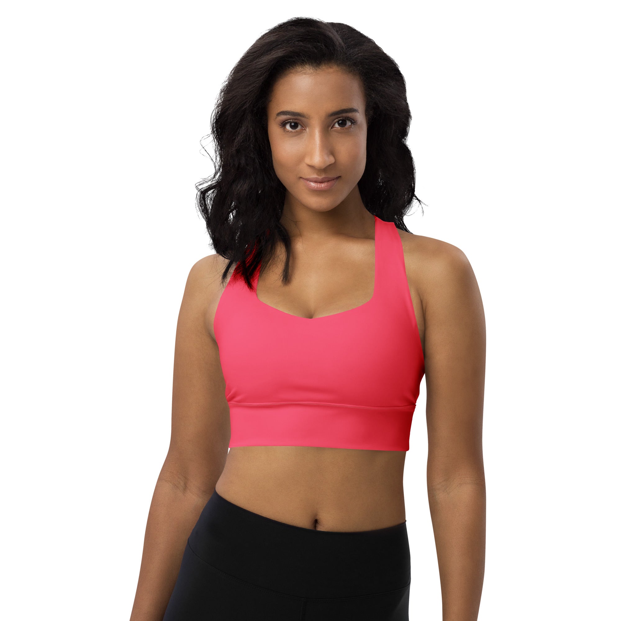 Bright pink seamless recycled longline sports bra with scoop neckline racerback for high intensity support