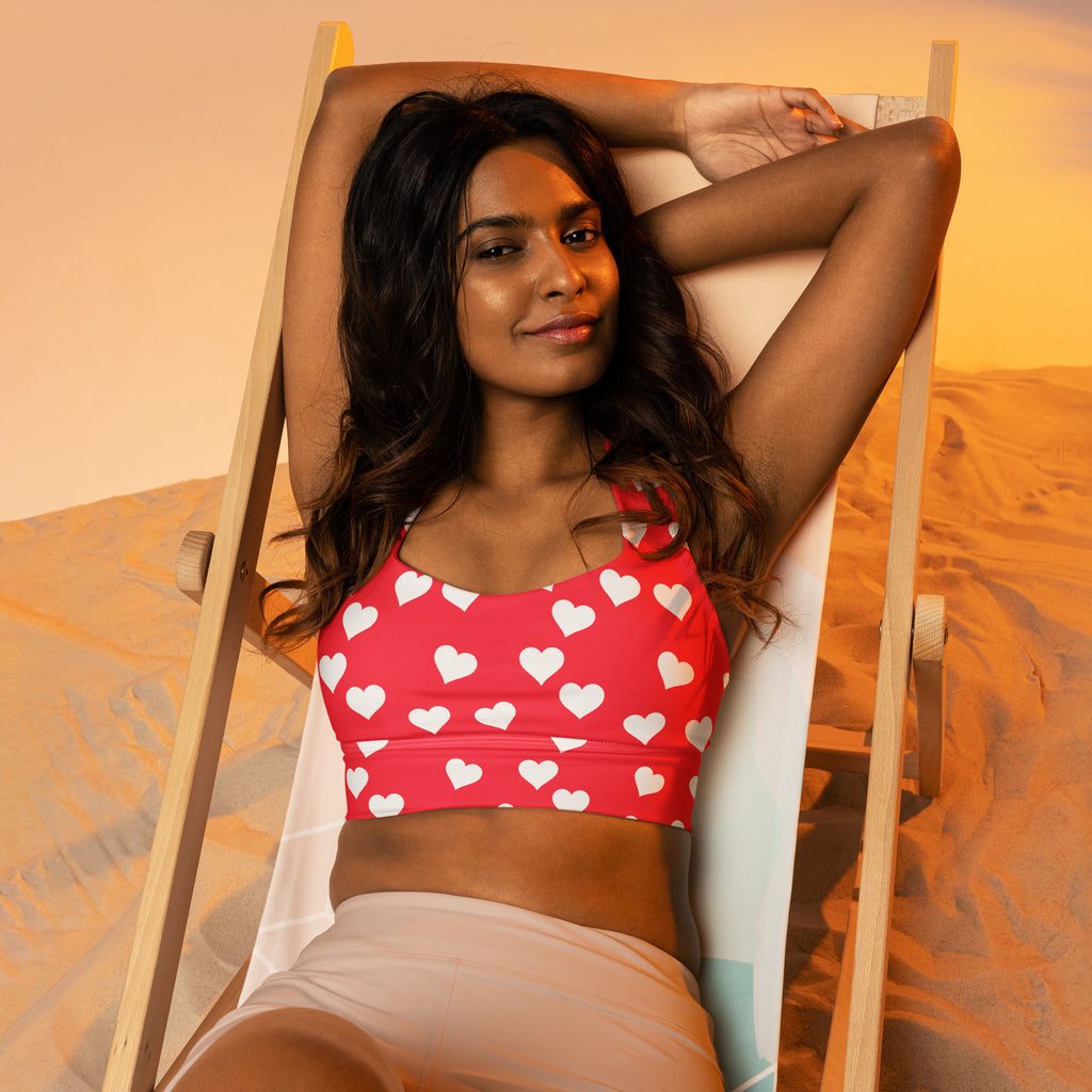 Women’s red heart valentine buttery soft recycled longline sports bra with white hearts for high intensity support