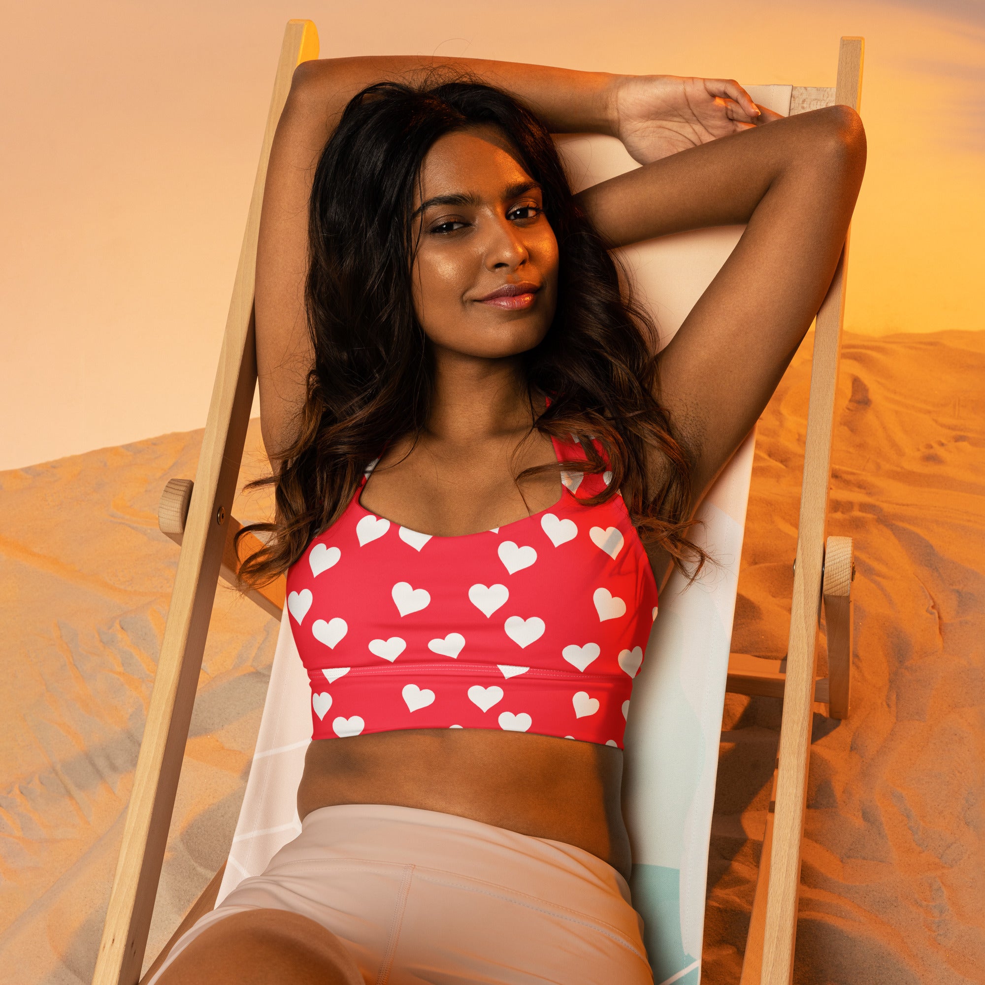 Women’s red heart valentine buttery soft recycled longline sports bra with white hearts for high intensity support