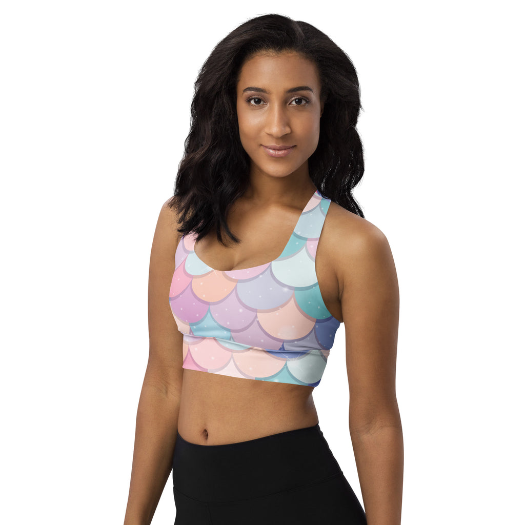 Pastel-colored rainbow mermaid scale pattern women’s longline sports bra with high intensity support and quick dry fabric