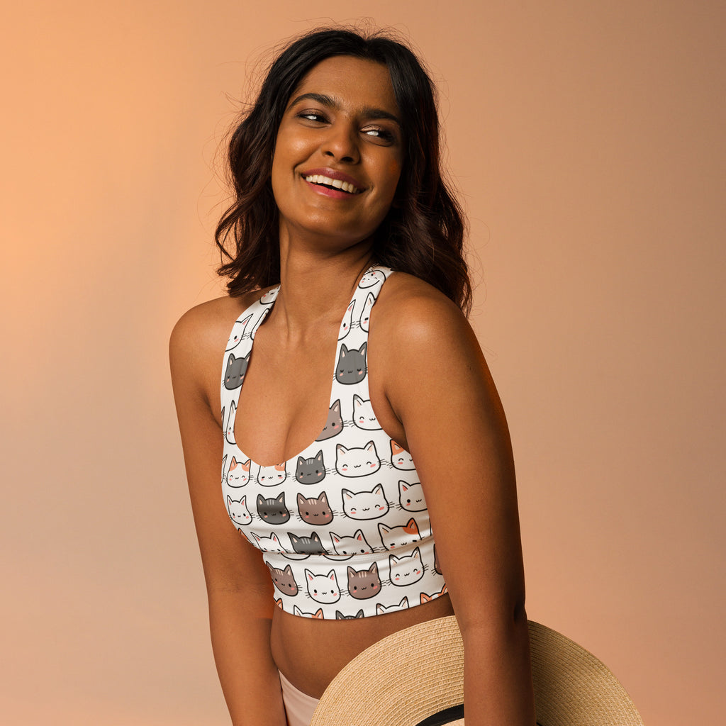 White longline sports bra with cat face pattern in gray white and orange buttery soft recycled fabric for high intensity support